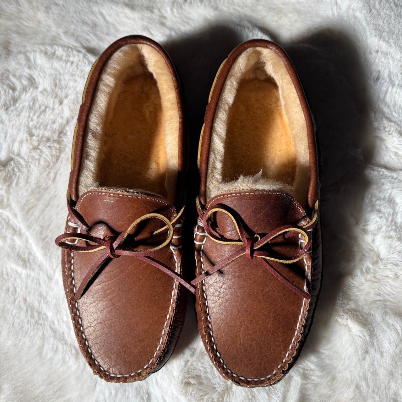 Top view of David's bison moccasin with white stitching