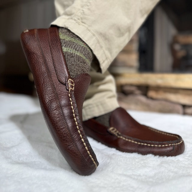 Side view of Mike's dark brown leather moccasin