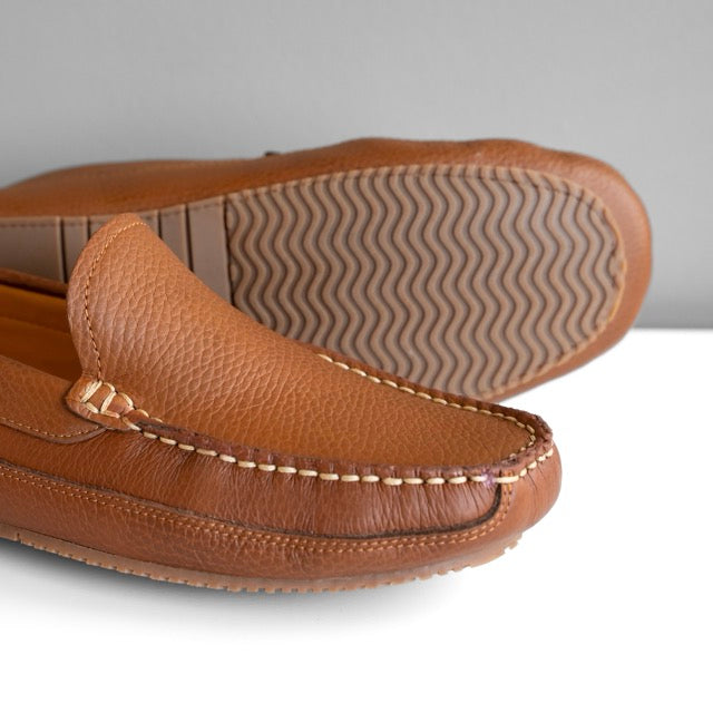 Sam's brown leather moccasin with rubber sole, slip-on style